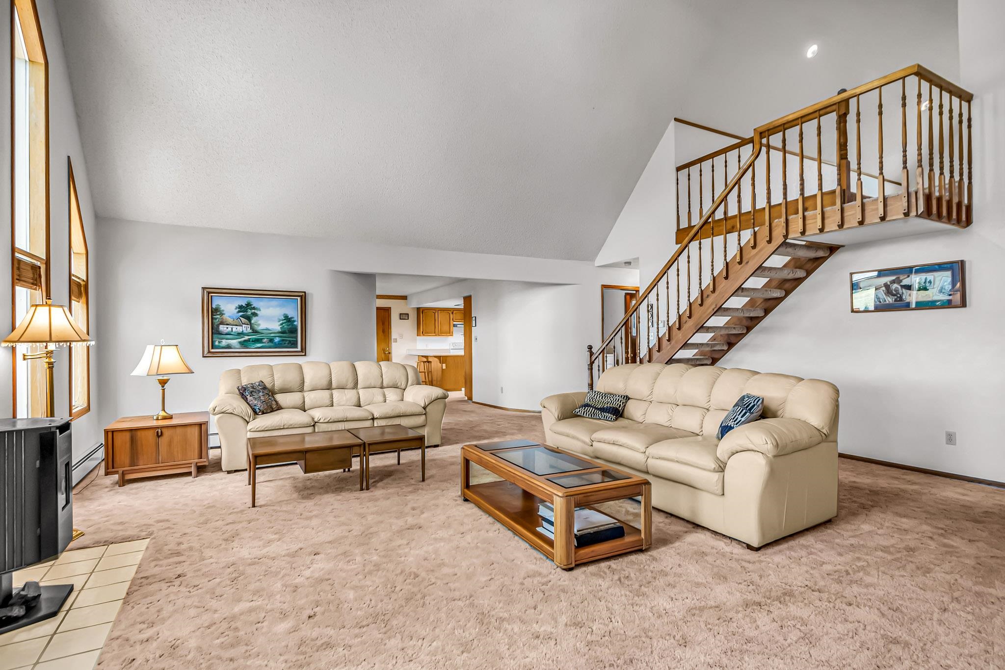 2648 H Road Grand Junction, CO 81506 - Photo 19 of 27 a living room with furniture and a table