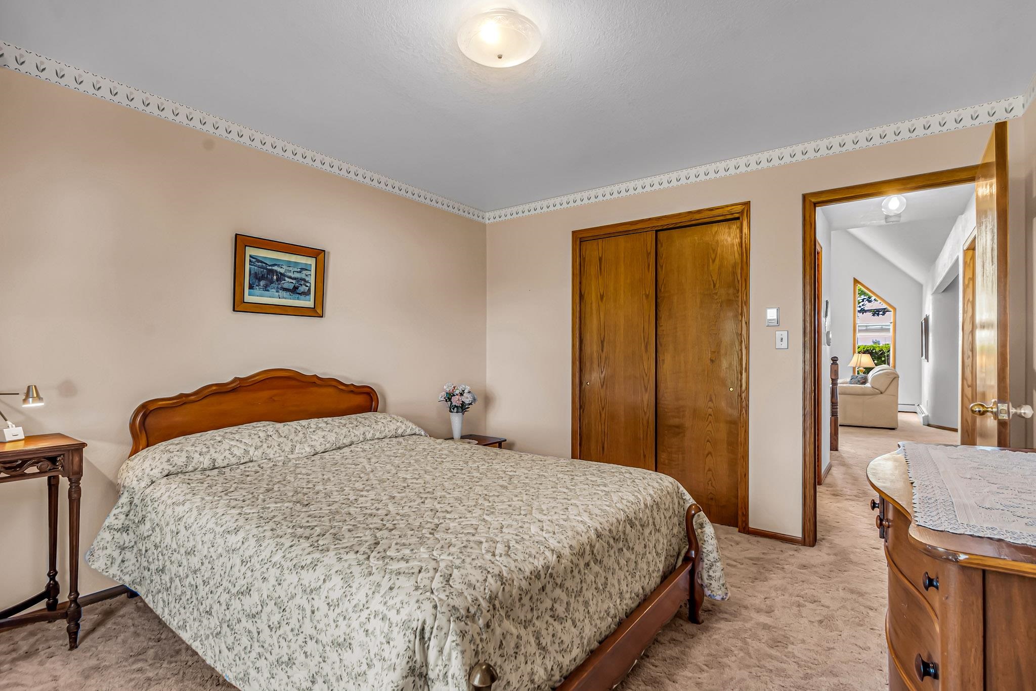 2648 H Road Grand Junction, CO 81506 - Photo 24 of 27 a bedroom with a bed and a table in it