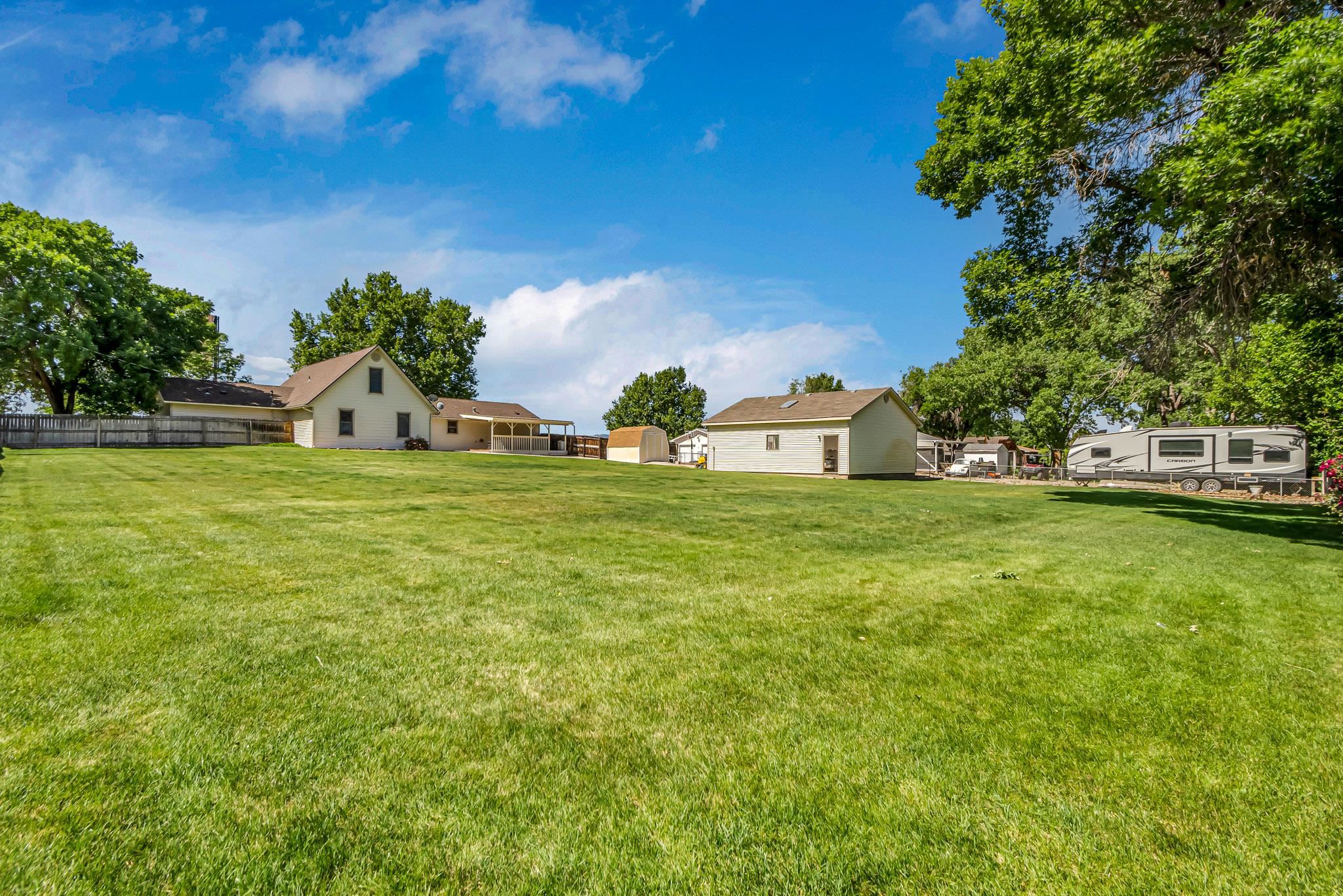 2648 H Road Grand Junction, CO 81506 - Photo 6 of 27 a view of a house with a big yard