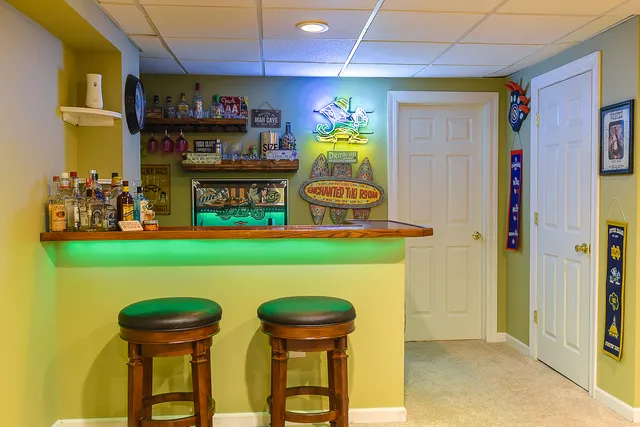 a kitchen with stainless steel appliances a stove and a refrigerator
