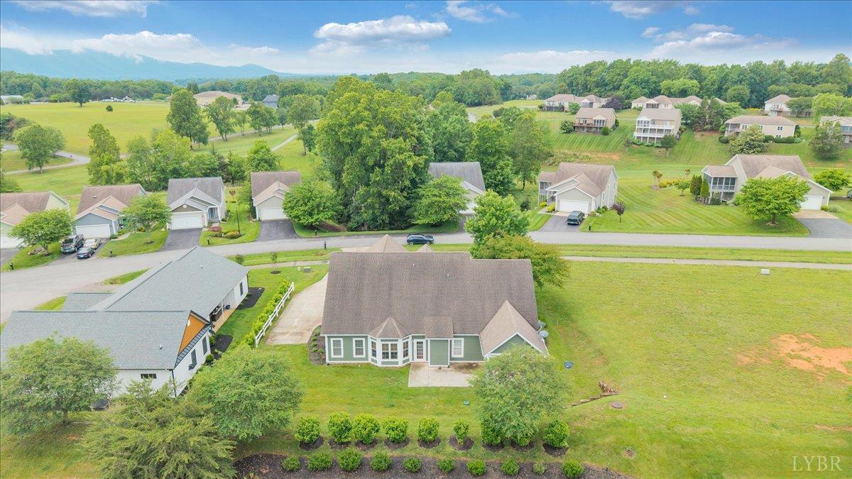 1250 Our Cove Road Huddleston, VA 24104 - Photo 59 of 70 an aerial view of a house with a garden and lake view