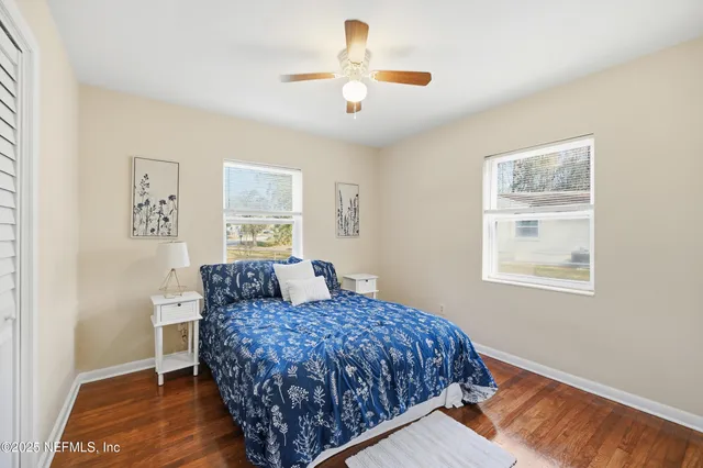 a bathroom with a sink toilet and mirror