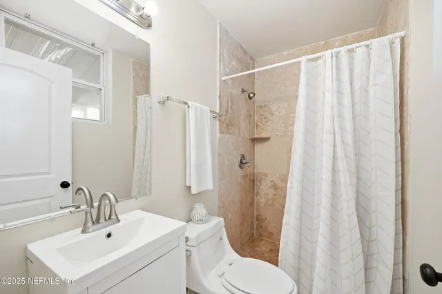 a view of a swimming pool with an outdoor seating