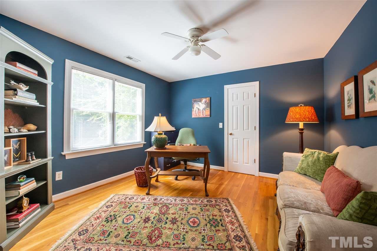 2621 Van Dyke Avenue Raleigh, NC 27607 - Photo 16 of 24 a living room with furniture and a rug