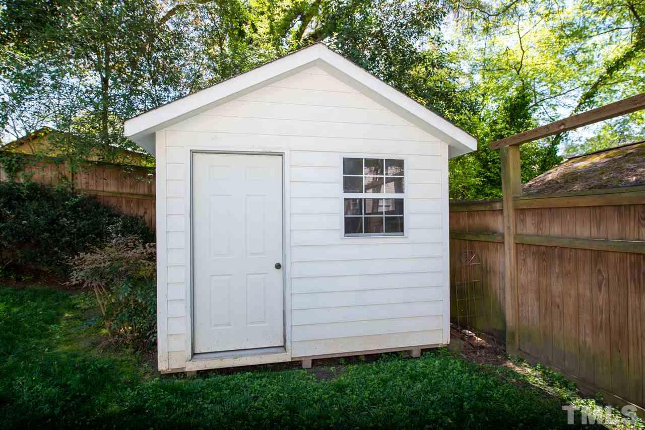 2621 Van Dyke Avenue Raleigh, NC 27607 - Photo 22 of 24 a view of a house with a yard