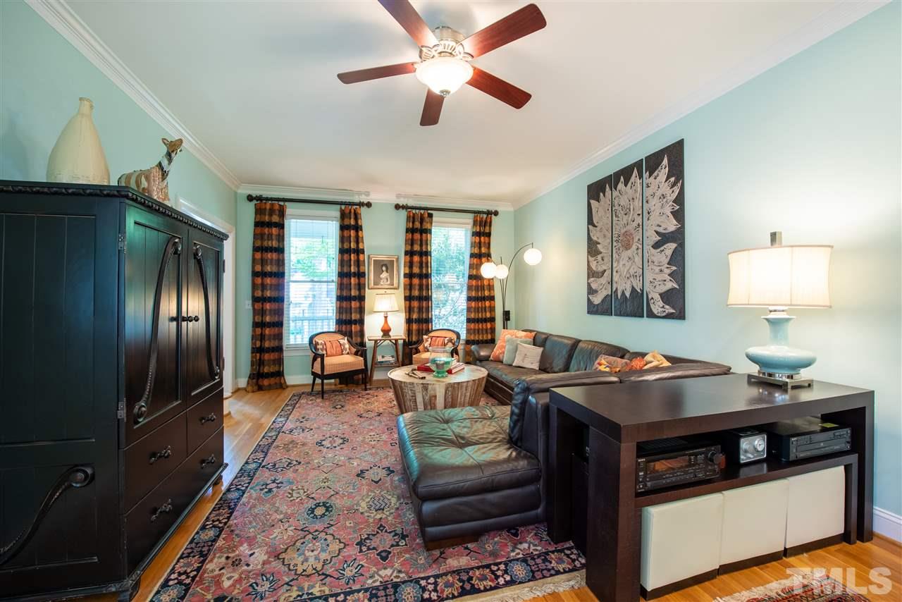 2621 Van Dyke Avenue Raleigh, NC 27607 - Photo 5 of 24 a living room with furniture and a flat screen tv