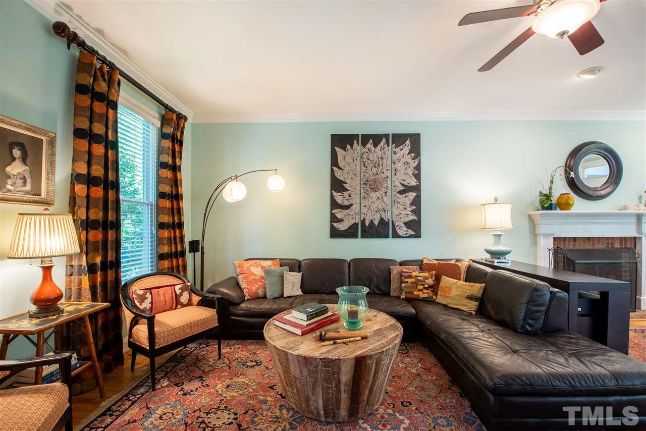 2621 Van Dyke Avenue Raleigh, NC 27607 - Photo 6 of 24 a living room with furniture and a fireplace