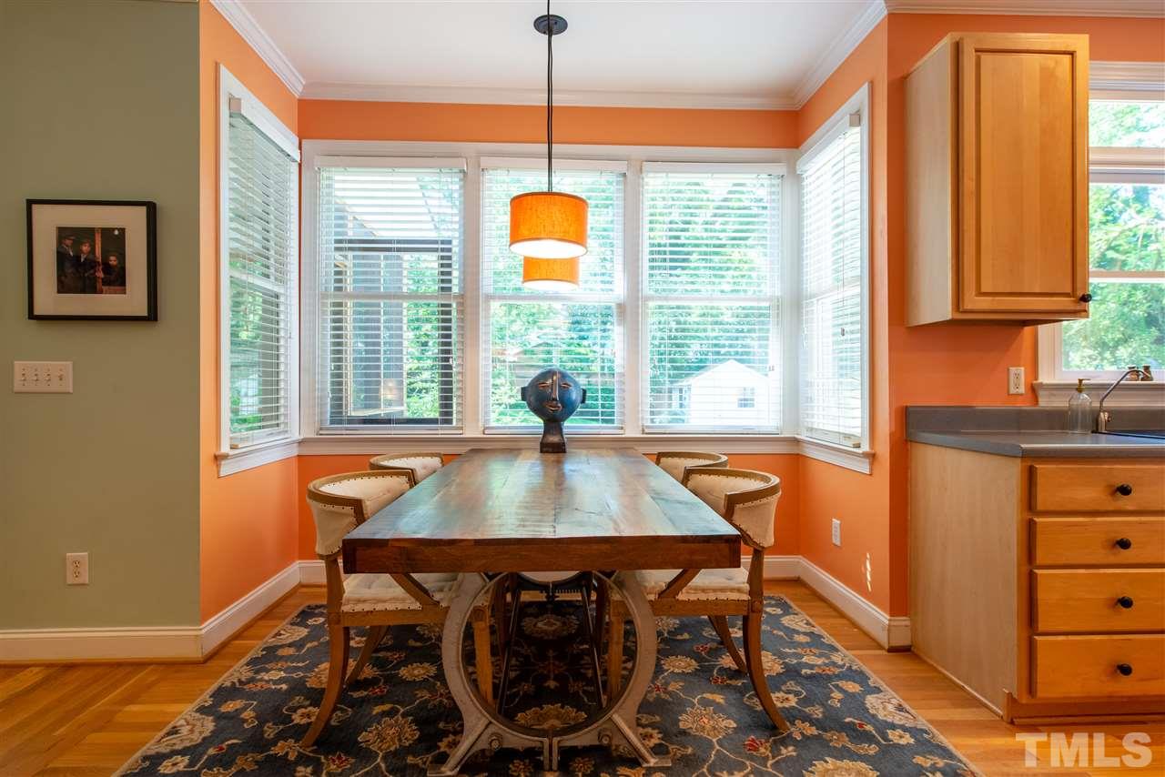2621 Van Dyke Avenue Raleigh, NC 27607 - Photo 10 of 24 a view of a dining room with furniture and a window