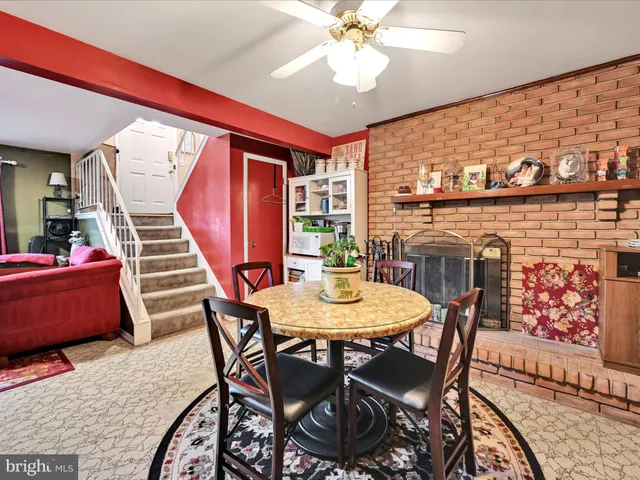 a project room with furniture and a large window
