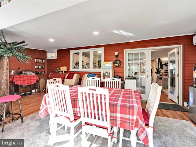 a kitchen with stainless steel appliances granite countertop a refrigerator stove microwave and sink