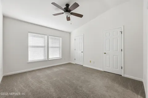 a bathroom with a sink vanity and a mirror