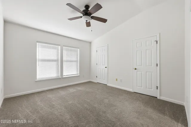 a bathroom with a sink vanity and a mirror