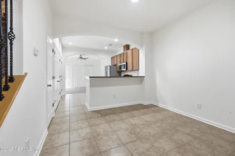 a kitchen with a stove microwave and sink