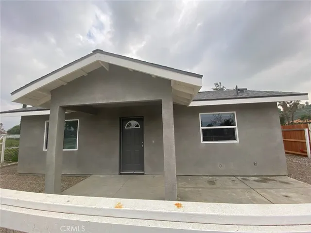 a view of a house with a door and a garage