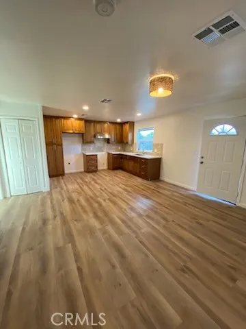 a view of a kitchen with a sink