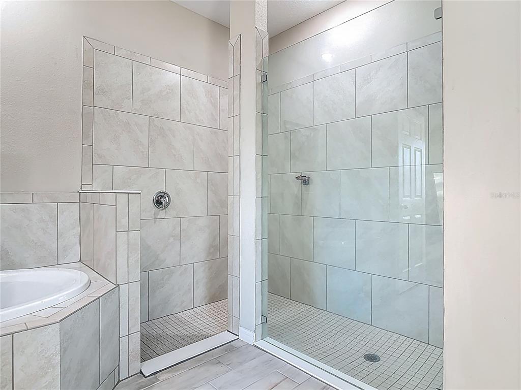39641 Royal Trails Road Eustis, FL 32736 - Photo 33 of 57 a bathroom with a shower