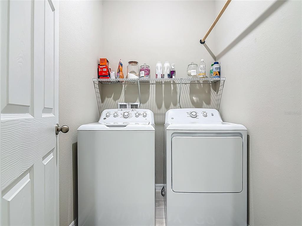 39641 Royal Trails Road Eustis, FL 32736 - Photo 43 of 57 a utility room with dryer and washer