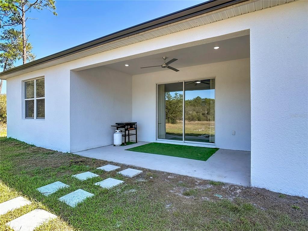 39641 Royal Trails Road Eustis, FL 32736 - Photo 45 of 63 a house view with a garden space