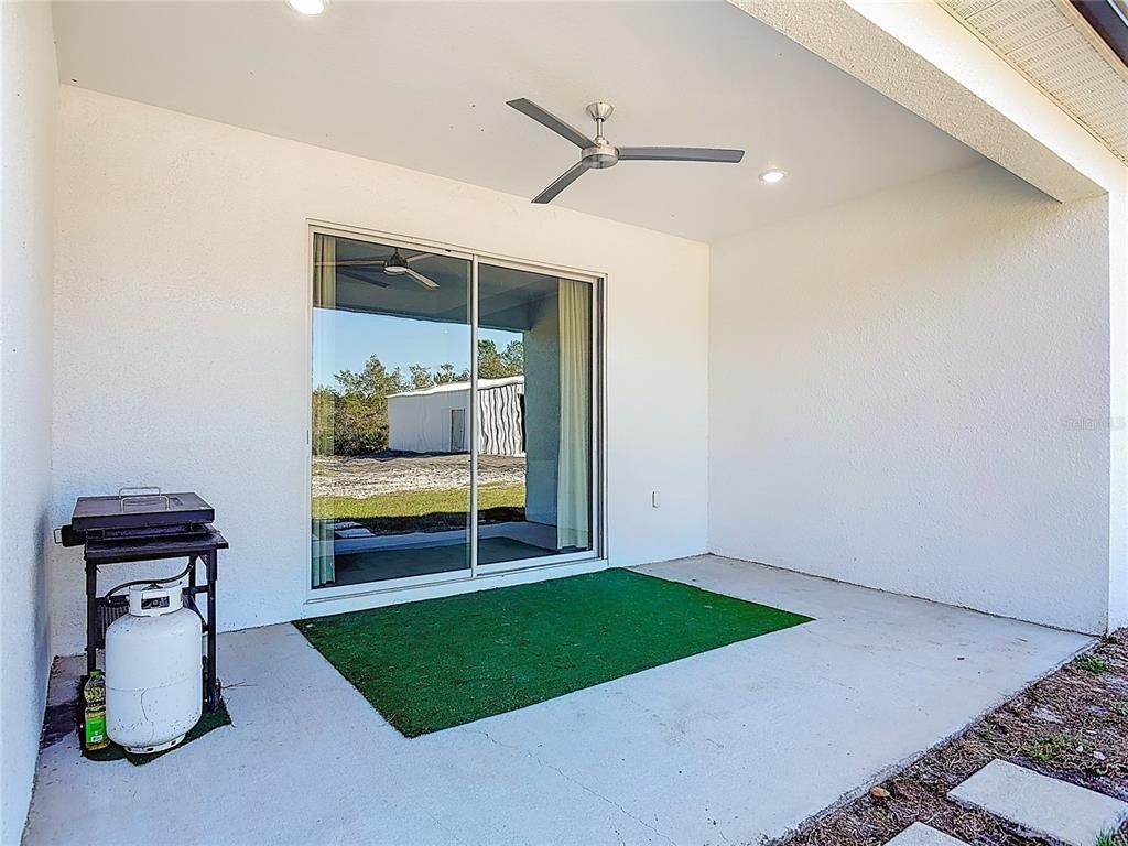 39641 Royal Trails Road Eustis, FL 32736 - Photo 46 of 63 a living room with furniture and a rug