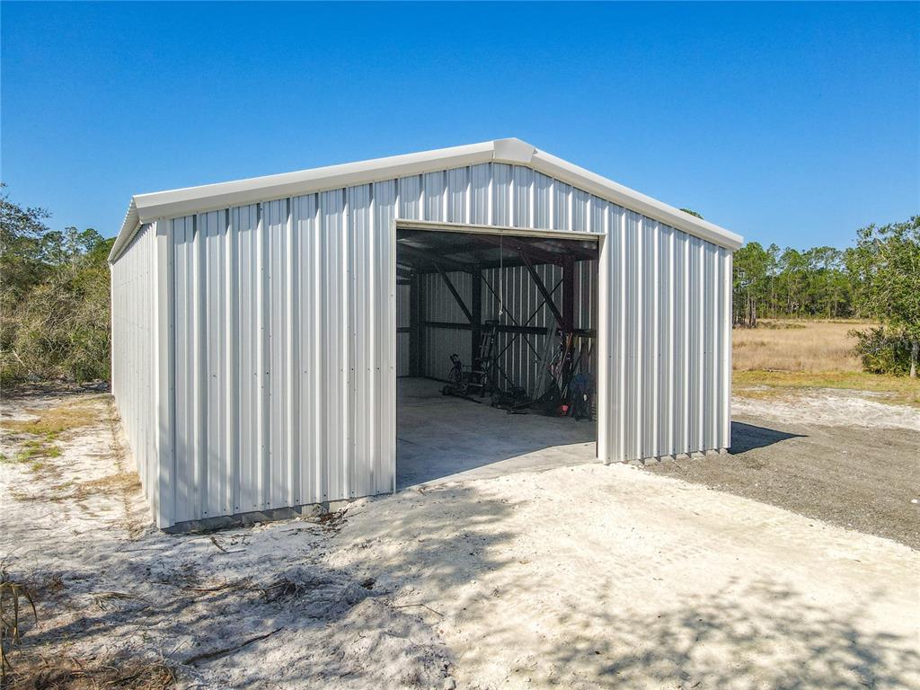 39641 Royal Trails Road Eustis, FL 32736 - Photo 51 of 63 a front view of a house with a yard