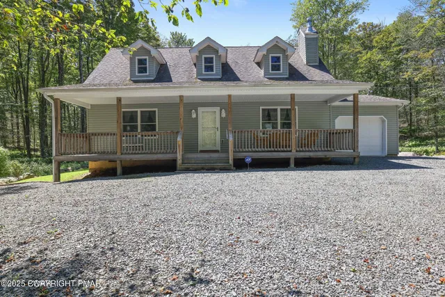 a view of a house with a garden