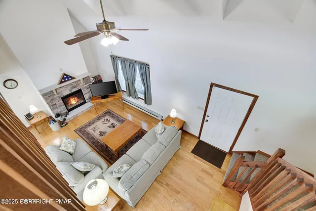 a bathroom with a shower and a glass door