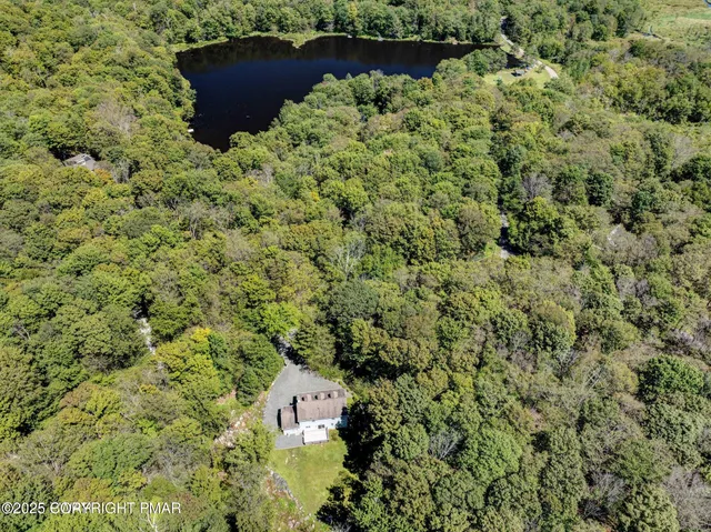 a view of a lake with a house