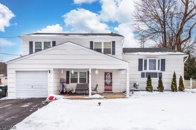 a front view of a house with a patio
