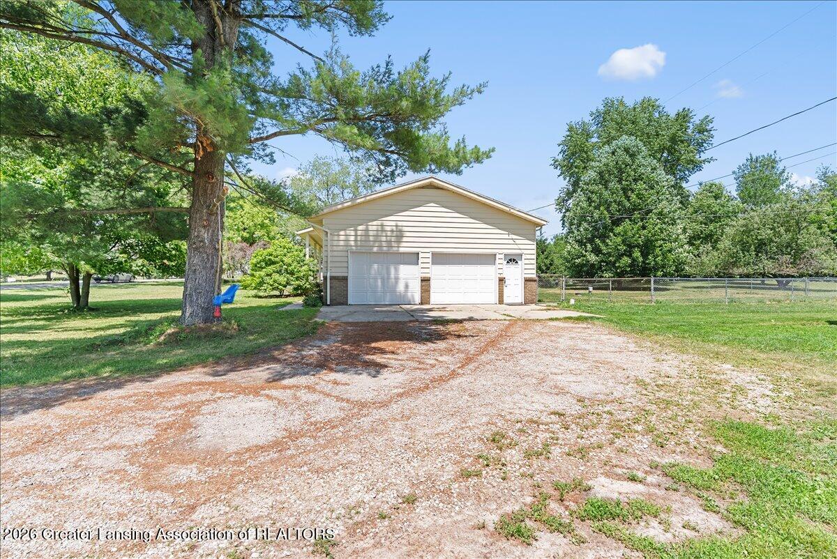 6970 Foster Road Haslett, MI 48840 - Photo 5 of 53 12-Media Jett - 06