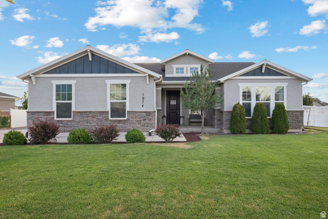 1074 South 750 West Springville, UT 84663 - Photo 1 of 28 Single-story residence featuring a stucco and stone veneer exterior