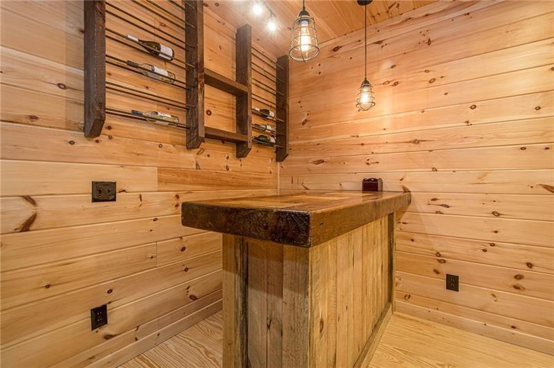 213 Moonshine Hollow Blue Ridge, GA 30513 - Photo 23 of 41 a bathroom with a sink and a shower