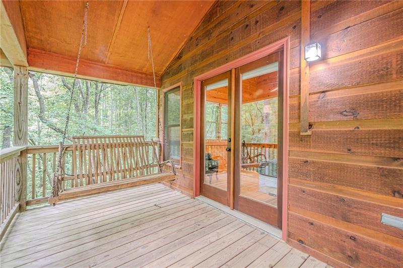 213 Moonshine Hollow Blue Ridge, GA 30513 - Photo 27 of 41 a view of a balcony with wooden floor