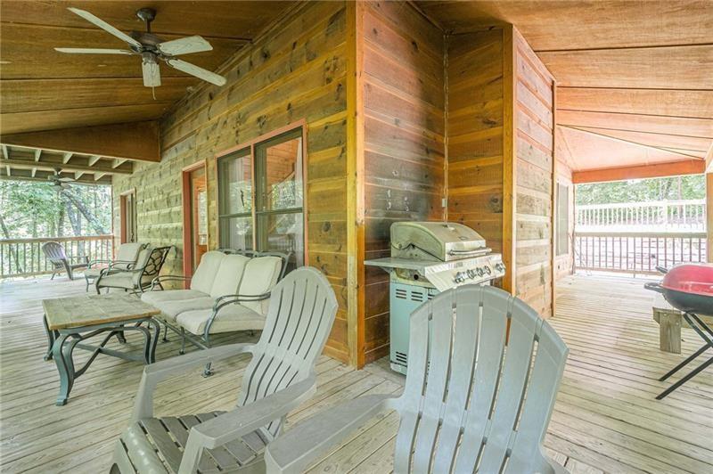 213 Moonshine Hollow Blue Ridge, GA 30513 - Photo 37 of 41 a living room with furniture and wooden floor