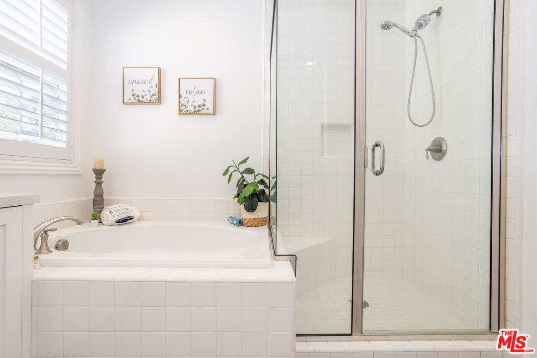 20621 West Chestnut Circle Porter Ranch, CA 91326 - Photo 12 of 30 a bathroom with a white tub