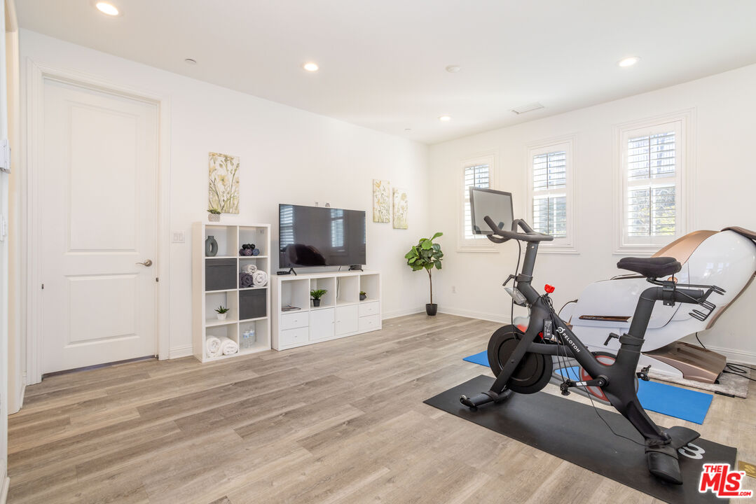 20621 West Chestnut Circle Porter Ranch, CA 91326 - Photo 18 of 30 a view of a room with gym equipment