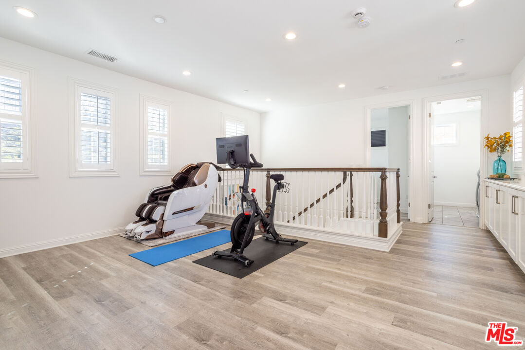 20621 West Chestnut Circle Porter Ranch, CA 91326 - Photo 20 of 30 a view of a room with gym equipment
