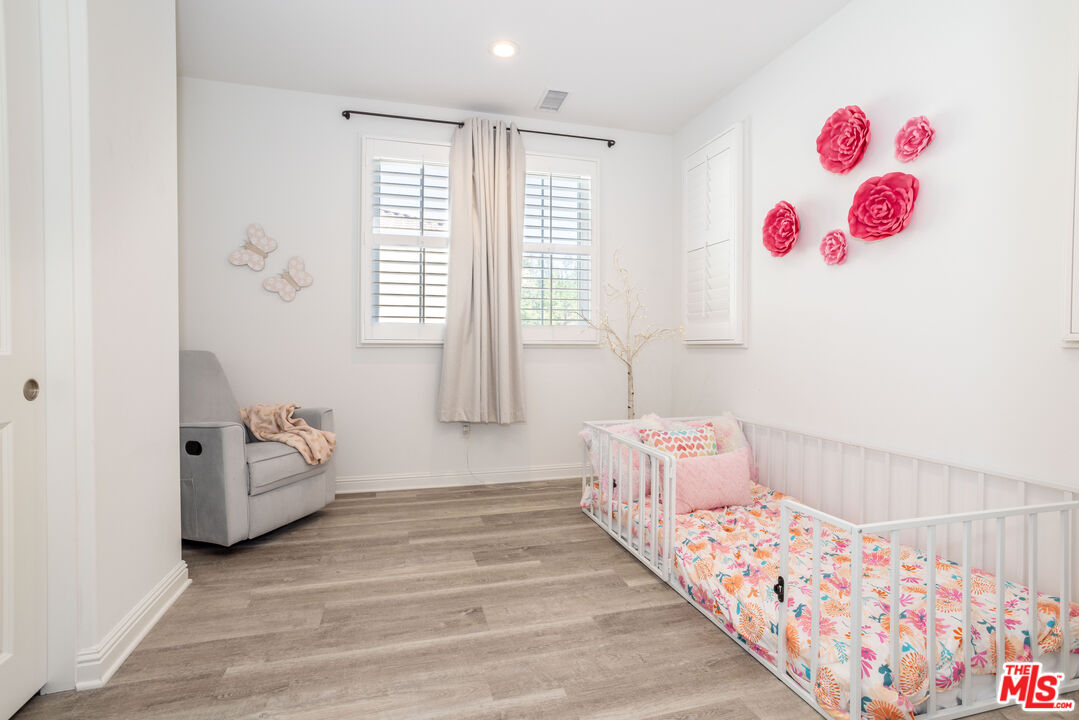 20621 West Chestnut Circle Porter Ranch, CA 91326 - Photo 21 of 30 a bedroom with furniture and a bathtub