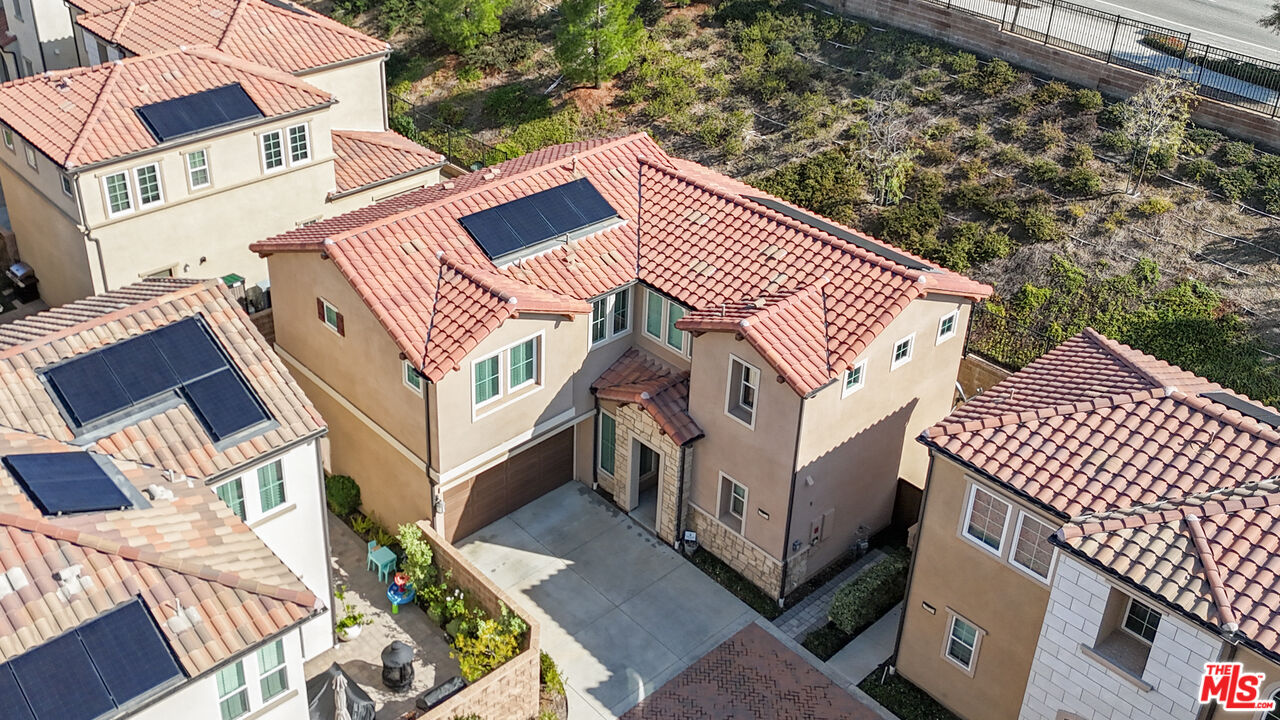 20621 West Chestnut Circle Porter Ranch, CA 91326 - Photo 28 of 30 a view of a house with wooden deck