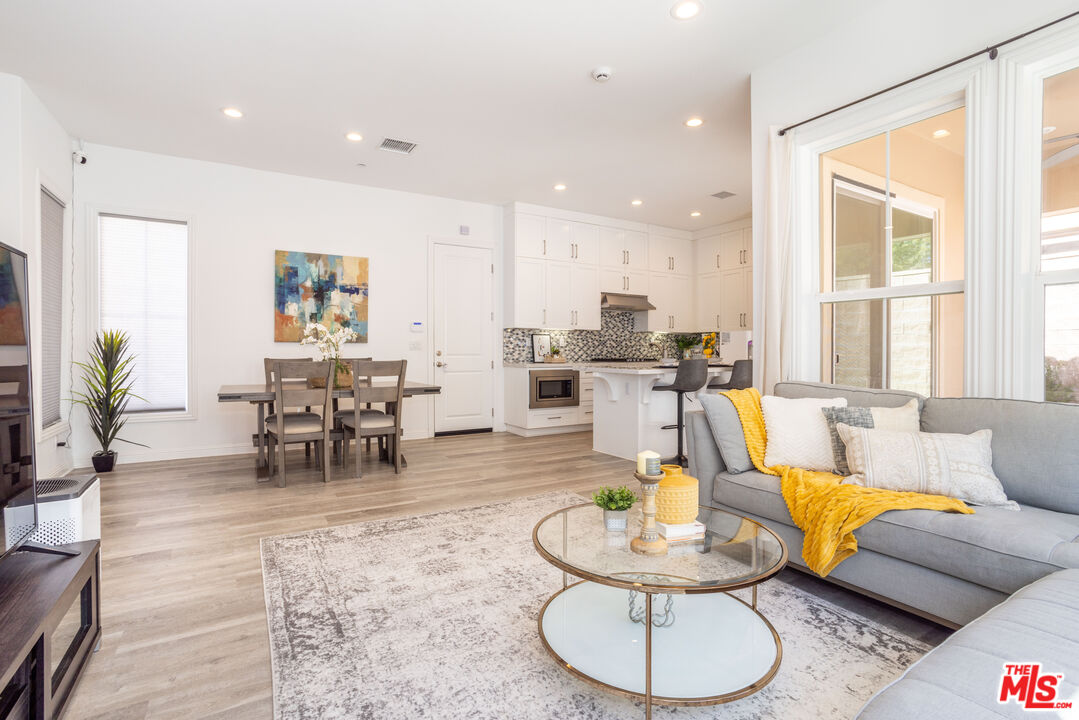 20621 West Chestnut Circle Porter Ranch, CA 91326 - Photo 4 of 30 a living room with furniture and wooden floor