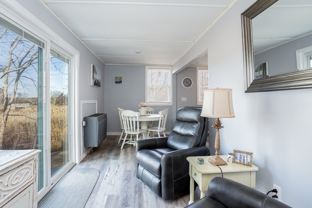 1 Ladd Avenue Wareham, MA 02571 - Photo 13 of 26 a living room with furniture and a table