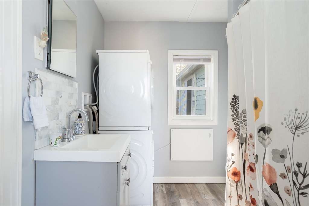 1 Ladd Avenue Wareham, MA 02571 - Photo 18 of 26 a bathroom with a sink and a mirror
