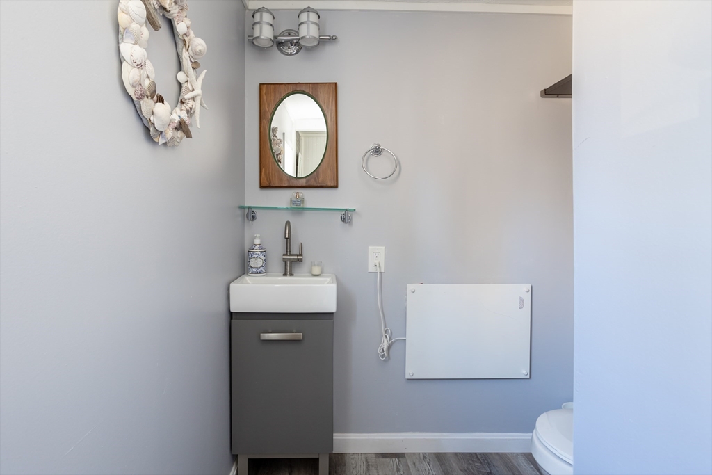 1 Ladd Avenue Wareham, MA 02571 - Photo 20 of 26 a bathroom with a toilet and a sink