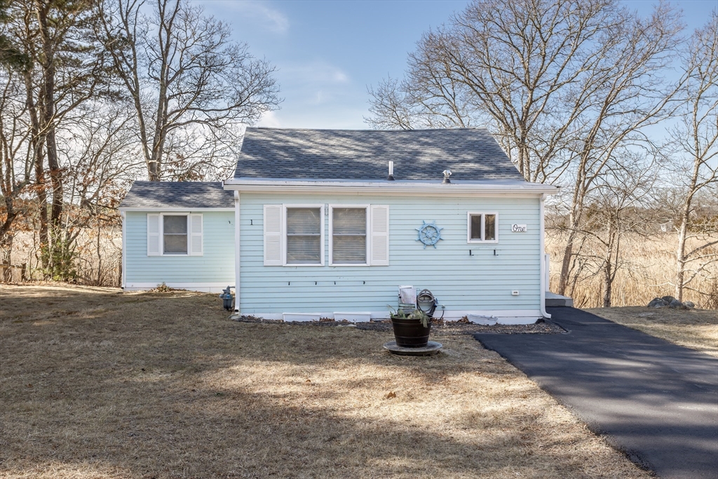 1 Ladd Avenue Wareham, MA 02571 - Photo 2 of 26 a view of a house with a yard covered in snow
