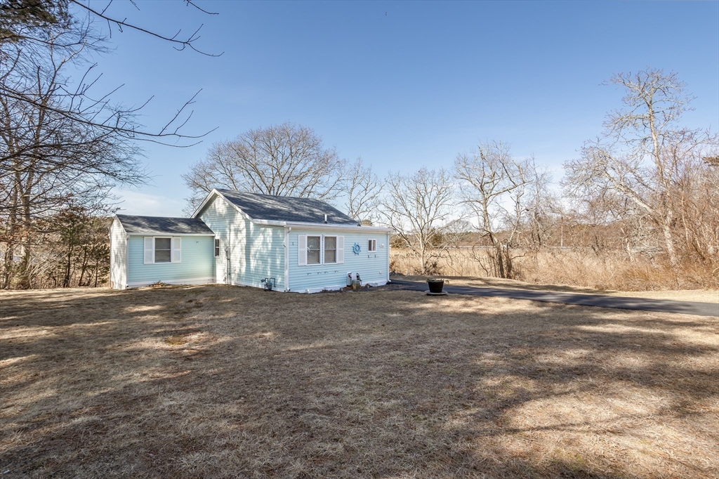 1 Ladd Avenue Wareham, MA 02571 - Photo 25 of 26 a view of a house with a yard and garage