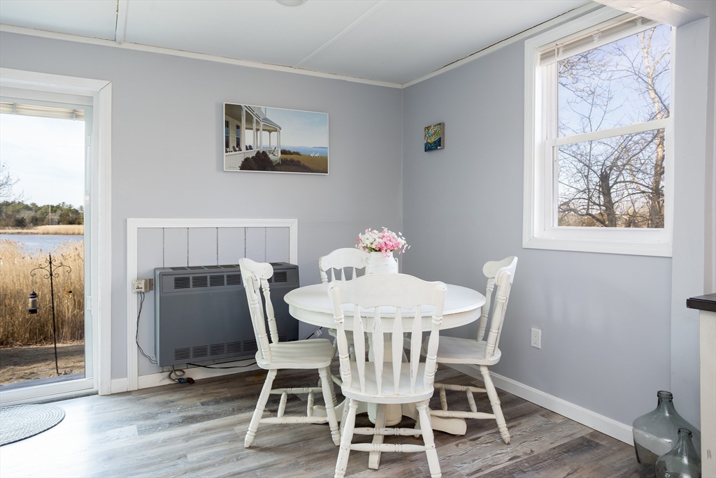 1 Ladd Avenue Wareham, MA 02571 - Photo 7 of 26 a view of a dining room with furniture window and wooden floor