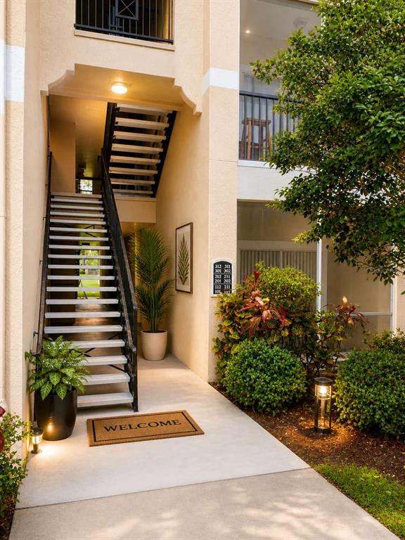 5122 Northridge Road, Unit 102 Sarasota, FL 34238 - Photo 2 of 14 a view of garden with wooden stairs