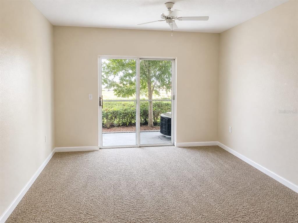 5122 Northridge Road, Unit 102 Sarasota, FL 34238 - Photo 3 of 14 an empty room with a window