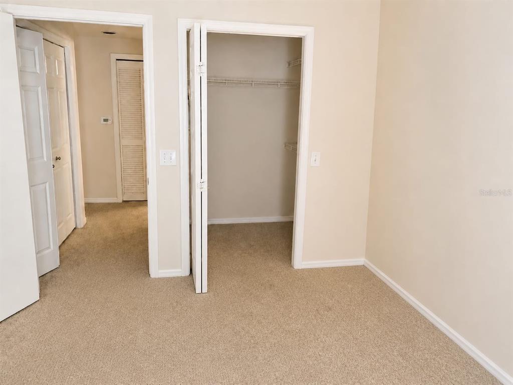 5122 Northridge Road, Unit 102 Sarasota, FL 34238 - Photo 4 of 14 a view of a room with a hallway