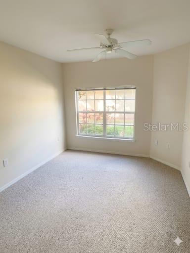5122 Northridge Road, Unit 102 Sarasota, FL 34238 - Photo 8 of 14 an empty room with a window