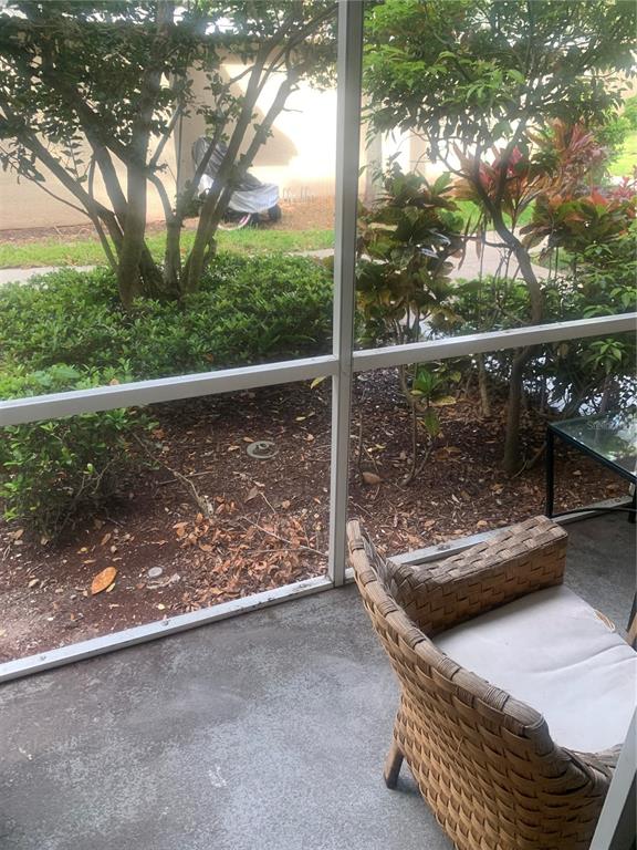 5122 Northridge Road, Unit 102 Sarasota, FL 34238 - Photo 8 of 12 a view of roof deck with couches and wooden fence